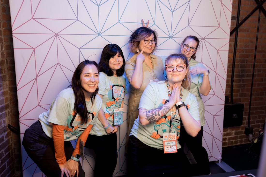 VGX staff posing together at the expo
