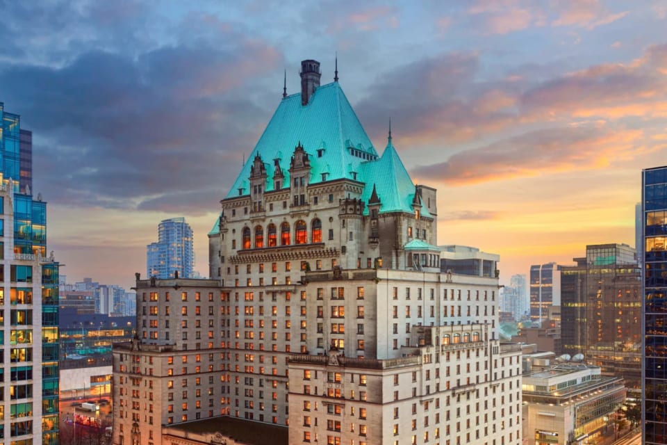 Fairmont Hotel Vancouver exterior at sunset